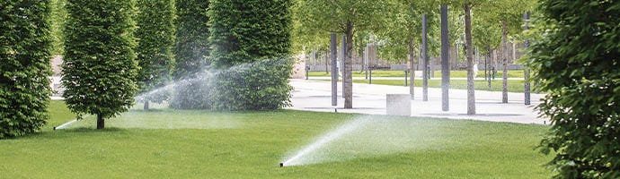 Irrigation sprinklers in park